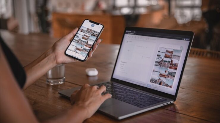 Woman Using Smartphone and Laptop